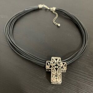 Chunky cross necklace multi strand black cord. Silver tone filigree cross.